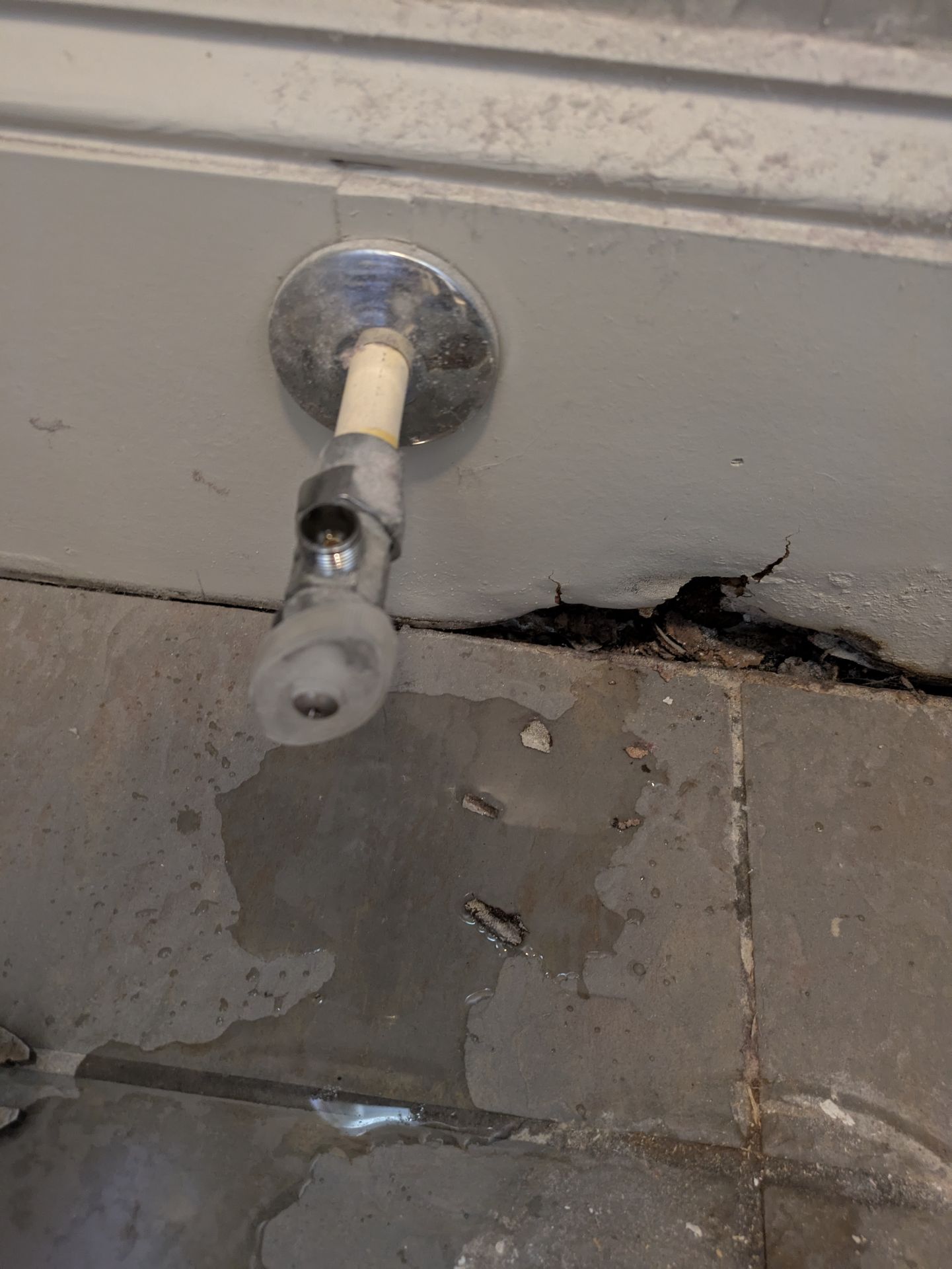 Installing new hot and cold water supply lines for a vanity